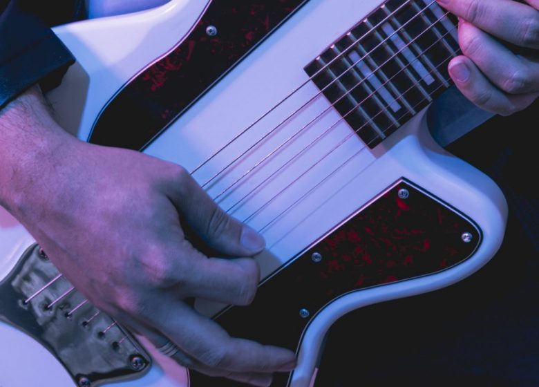 hands-playing-beautiful-electric-guitar